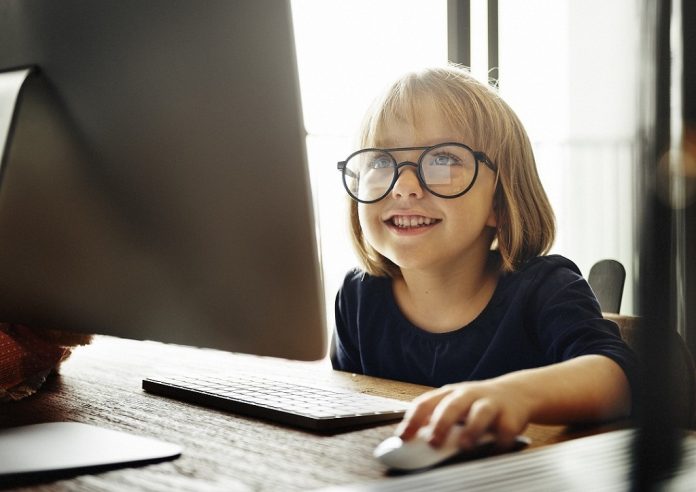 Kid Surfing Computer Internet Lifestyle Concept